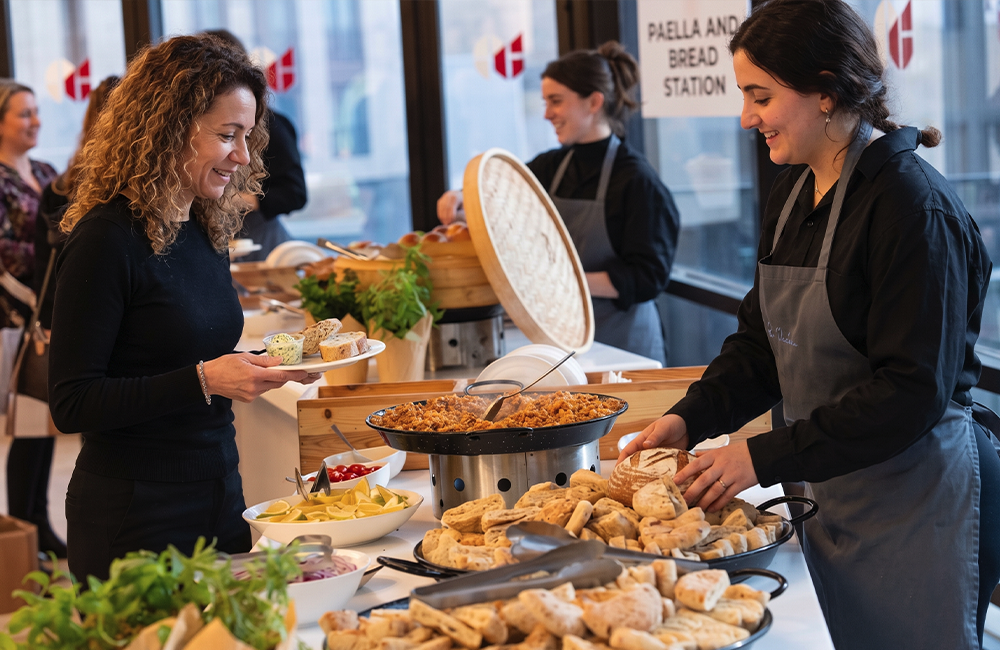 Catering staff serving guests at a private event